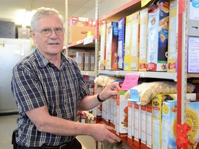 Al Marten, administrator of the Simcoe Caring Cupboard, reports increased demand at the downtown Simcoe food bank as housing and grocery costs continue to rise.