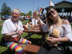 Jaime Stephens, originally from Dunnville, on the left, and Stevie Martindale, originally from Caledonia, were making ribbon wands Saturday at the Haldimand Norfolk Pride Day event in Caledonia. CHRIS ABBOTT