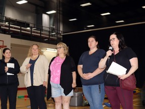 Fox Creek Mayor Sheila Gilmour, far right, addressed evacuees with an update on their situation Wednesday morning at the Allan and Jean Millar Centre in Whitecourt. Fox Creek was evacuated due to a wildfire originating near Eagle Tower Road.