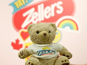 Zeddy Bear in front of Zellers wall sign.