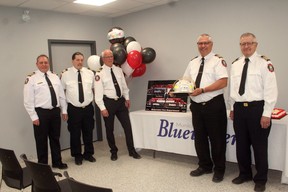 The Municipality of Bluewater celebrated the retirement of fire chief Dave Renner, second from right, at an open house at the newly-renovated Zurich fire station on Saturday, May 13. From left are Brucefield district chief Jeff Denys, Hensall district chief Paul Clendenning, Zurich district chief and Bluewater acting chief Dave Erb, Renner and Bayfield district chief Brian Brandon. Scott Nixon