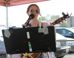 Acoustic musician Jess Rayner of Port Dover was one of several local performers featured on Saturday at the Fairgrounds Festival in Simcoe.