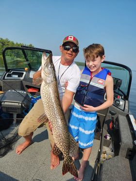North Bay news: Boy, 8, catches massive pike on Lake Nipissing