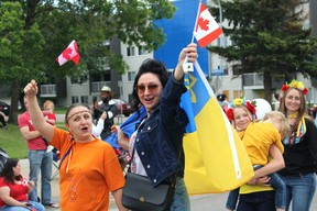 Members of the Fort McMurray Ukrainian Cultural Society march in the Canada Day Parade in Fort McMurray on July 1, 2022. Vincent McDermott/Fort McMurray Today/Postmedia Network