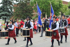 The Royal Canadian Legion's pipes and drums band marches in the Canada Day parade in Fort McMurray on July 1, 2022. Vincent McDermott/Fort McMurray Today/Postmedia Network