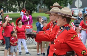 Wood Buffalo RCMP officers march in the Canada Day parade in Fort McMurray on July 1, 2022. Vincent McDermott/Fort McMurray Today/Postmedia Network