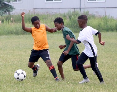 Soccer players from the Nigerian Community Association of Greater Sudbury took on members of the Greater Sudbury Police Service in a friendly game of soccer at Ecole secondaire du Sacre-Coeur in Sudbury on Saturday, June 24, 2023. The Nigerian Community Association is a non-profit organization with the primary objective of bringing together Nigerian residents in Greater Sudbury and building relationships in the community to strengthen the quality of life for the Nigerian Sudburian population. Saturday's event began with an exhibition between men's and women's teams, then continued with speeches and team photos before the Nigerian and GSPS squads squared off.