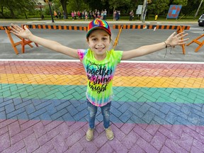 Ryder Mandryk on the rainbow crosswalk in Simcoe