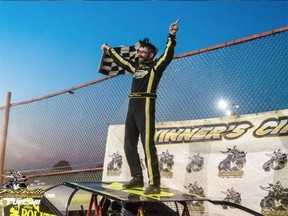 Danny O'Brien of Kingston celebrates his 100th career Modified victory at Brockville Ontario Speedway
