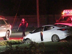 Emergency services respond to a single-vehicle collision on Bayridge Drive in Kingston, Ont. on Thursday,