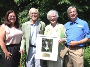 On June 19 Douglas and Blu Mackintosh were presented with the Ontario Nature Public Service Award in recognition of their 45 years of work as environmentalists, conservationists and activists in Ontario. L-r, TLT Mayor Corinna Smith-Gatcke, Douglas and Blu Mackintosh, and Dan Shire of Ontario Nature. Lorraine Payette/for Postmedia Network