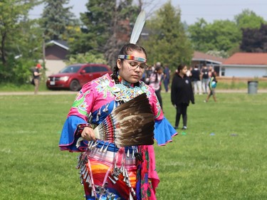 Niibishens takes part in a jingle dress dance at a pow wow at St. Charles College in Sudbury, Ont. on Tuesday June 6, 2023. Students from 15 elementary and secondary schools from the Sudbury Catholic District School Board participated. The cultural event featured traditional dancing, regalia, cultural teachings and authentic Anishinaabe food. John Lappa/Sudbury Star/Postmedia Network