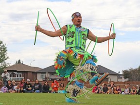Dallas Arcand performed a hoop dance for attendees of National Indigenous Peoples Day at Graham Acres on Wednesday afternoon.
