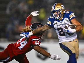 Winnipeg Blue Bombers running back Brady Oliveira pounded the ball on the ground for 112 yards to lead the Bombers on a wet and stormy night in Montreal.