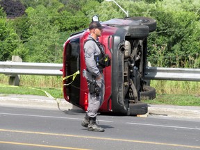 Kingston Police on the scene of a two-vehicle collision near the intersection of Bayridge and Coverdale drives in Kingston, Ont., on Thursday, July 27, 2023. (Elliot Ferguson/The Whig-Standard/ Postmedia Network)