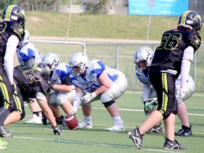 Players from the Sudbury Junior Spartans line up against the Quinte Skyhawks during Ontario Summer Football League U16 action at James Jerome Sports Complex on Saturday, June 24, 2023.