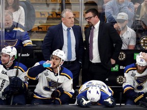 Head coach Craig Berube of the St. Louis Blues speaks with assistant coach Mike Van Ryn against the Boston Bruins during the first period in Game One of the 2019 NHL Stanley Cup Final at TD Garden on May 27, 2019 in Boston, Massachusetts. (Photo by Patrick Smith/Getty Images)