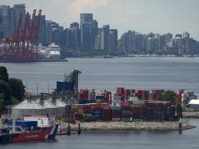 Stacks of cargo containers are seen at port during a strike by International Longshore and Warehouse Union Canada workers in the province, in Vancouver, on Wednesday, July 12, 2023.