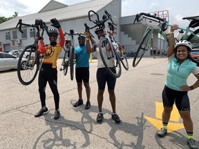 Friends Jason Glover, left, Anderson Williams, Jeff Glover and Mariah Laroco came from the Ottawa and Durham area to try out Le Tour de Norfolk on Sunday, powering through the hours of riding on what they dubbed a “very bicycle-friendly” area.