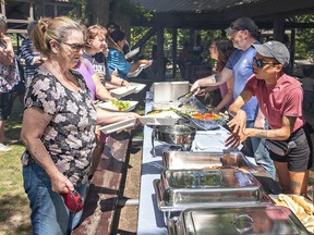 free food is handed out at Emancipation Day celebrations in Brantford