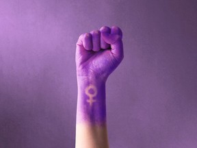 Stock photo woman's fist women's empowerment