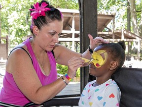 face painting at Emancipation Day celebrations in Brantford