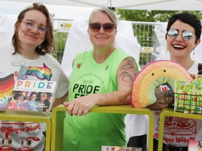 Paetah Burgess, left, Julie Hillier-Vrolyk and Laura McCann were at The Book Keeper's booth at Sarnia-Lambton Pridefest Saturday