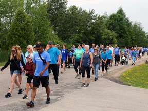 A long line of walkers set out on the five-kilometre course from Owen Sound Fitness and Training Saturday morning for the second annual Walk for Courage fundraiser and mental health awareness event. Greg Cowan/The Sun Times