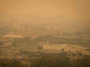 Smoke from wildfires fills the air in Kelowna, B.C., Saturday, Aug. 19, 2023.