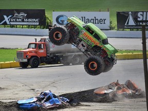 Avenger monster truck driver and two-time world freestyle champion Jim Koehler puts on a show for the fans with some cool tricks during the Monster Truck Throwdown at Delaware Speedway on Saturday July 29, 2023. Calvi Leon/The London Free Press