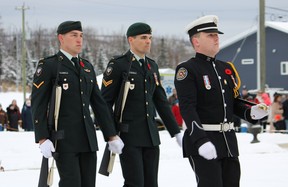A private with the Royal Canadian Artillery, a corporal with the Princess Patricia’s Canadian Light Infantry and a member of the Fort McMurray Fire Department during Remembrance Day ceremonies at Legion Branch 165 in Waterways on Thursday, November 11, 2021. Vincent McDermott/Fort McMurray Today/Postmedia Network