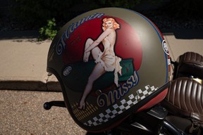 A pinup girl on a motorcycle helmet at the Acden Show and Shine in Fort McMurray on August 13, 2023. Vincent McDermott/Fort McMurray Today/Postmedia Network