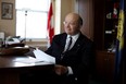 Senator Hugh Segal pose for a photograph at his office on Feb. 14, 2013 on Parliament Hill in Ottawa.