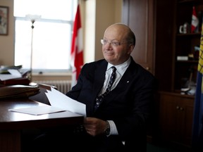 Senator Hugh Segal pose for a photograph at his office on Feb. 14, 2013 on Parliament Hill in Ottawa.