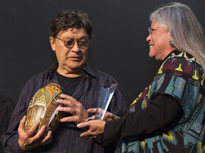Robbie Robertson, legendary songwriter with The Band, was presented a lifetime achievement award by former Six Nations elected chief Ava Hill on October 14, 2017 at the Gathering Place on Six Nations of the Grand River Territory near Brantford. Robertson died on Aug. 9, 2023 at age 80. Brian Thompson/Brantford Expositor file