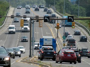 Drivers make their way along Princess Street near the intersection of Taylor Kidd and John Counter boulevards in Kingston, Ont., on Thursday, August 3, 2023.