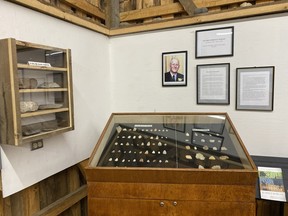 Display case with Indigenous arrowheads