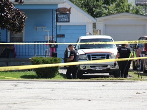 Police forensics officials were on the scene at 222 Napier St. in Sarnia Monday, investigating a shooting.