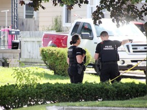 Police forensics officials were on the scene at 222 Napier St. in Sarnia Monday, investigating a shooting.