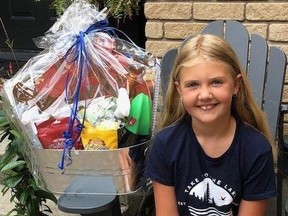 Ellie Dacey, 8, won a gift basket from the Long Lake Stewardship Committee.