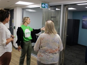Hannah Janzen, part of the Spoken Hope Youth Advisory Council, leads a tour Aug. 22, 2023 of the new Youth Wellness Hubs Ontario Sarnia Lambton location.