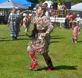 Katelyn Peters, 24, of Muncee Delaware-First Nation, dances in a beautiful jingle dress during the Delaware Nation Competition Powwow held Saturday in Moraviantown.  (Ellwood Shreve/Chatham Daily News)