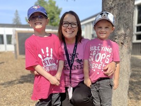 Staff and students in Rainbow schools will wear pink on Thursday to mark Stand Up Against Bullying Day. Chelmsford Valley District Composite School students Rayden Laperriere, left, and Sammy Wood joined principal Danielle Williamson in wearing pink last year.