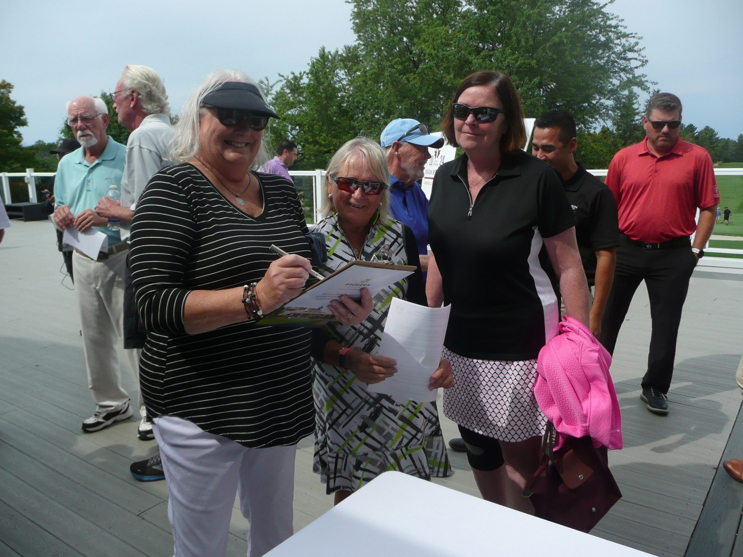 Sylvia Sheard (left) volunteer coordinator for the Canadian Senior Men’s golf tournament to be held next September at Saugeen Golf Club talked with potential volunteers Mary-Jo O’Donohue (right) and Carol Jack Carol  September 11 as Golf Canada announced that the club would host the event. It is estimated 200 volunteers would be needed for the event that is expected to draw approximately 180 amateur men golfers.