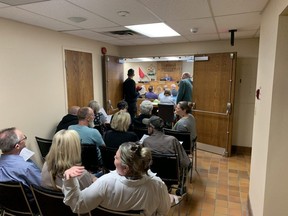 Extra seats were added to the hallway outside Woodstock city council chambers for a public meeting on a proposed supervised drug-use site on Tuesday, Sept. 26, 2023. (Brian Williams/The London Free Press)