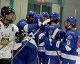 Greater Sudbury Cubs players Cameron Shanks (7), Hudson Chitaroni (93), Ben Harris (16), Brock Houser (19) and Hudson Martin (18) celebrate Chitaroni's power-play goal against the Elliot Lake Vikings at Gerry McCrory Countryside Sports Complex in Sudbury, Ontario on Thursday, September 28, 2023.