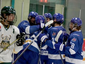 Greater Sudbury Cubs players Cameron Shanks (7), Hudson Chitaroni (93), Ben Harris (16), Brock Houser (19) and Hudson Martin (18) celebrate Chitaroni's power-play goal against the Elliot Lake Vikings at Gerry McCrory Countryside Sports Complex in Sudbury, Ontario on Thursday, September 28, 2023.