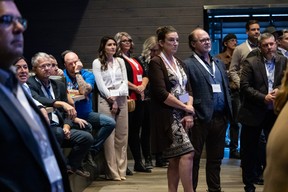 People listen to N.L. premier Andrew Furey speak at Earls in downtown Fort McMurray during a job fair targeting people from Newfoundland and Labrador on September 21, 2023. Vincent McDermott/Fort McMurray Today/Postmedia Network