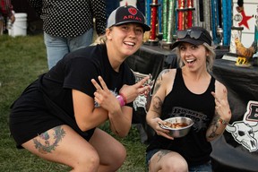 Ribbers promote their barbecue sauce at Wood Buffalo Ribfest in Fort McMurray on August 31, 2023. Vincent McDermott/Fort McMurray Today/Postmedia Network