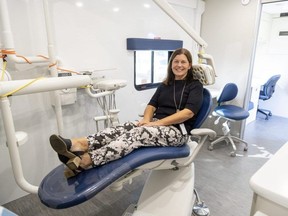 Kim Casier, manager of oral health services at Southwestern Public Health, sits inside its mobile dental clinic in St. Thomas on Wednesday, Sept. 20, 2023. (Derek Ruttan/The London Free Press)